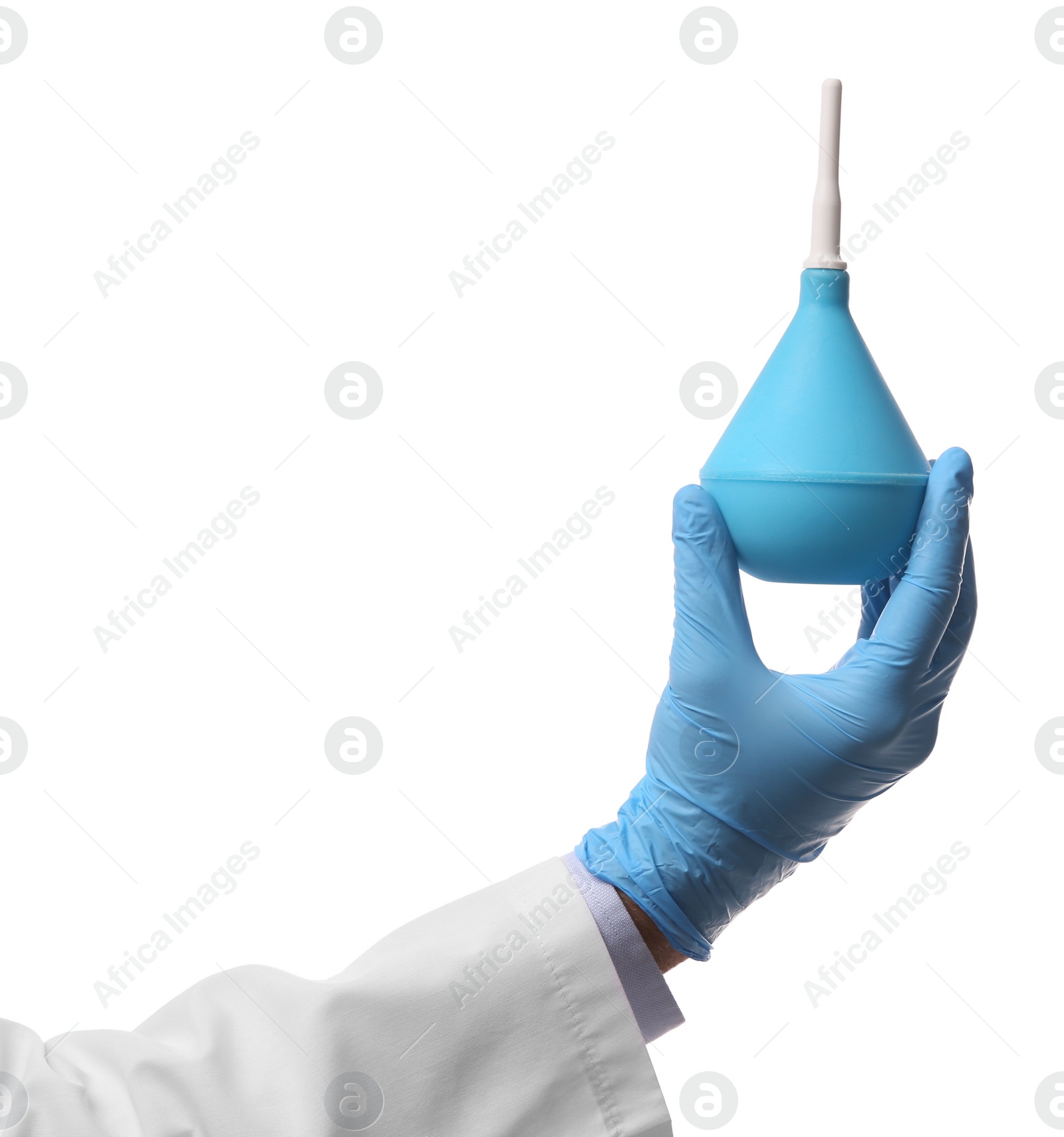 Photo of Doctor holding light blue enema on white background, closeup