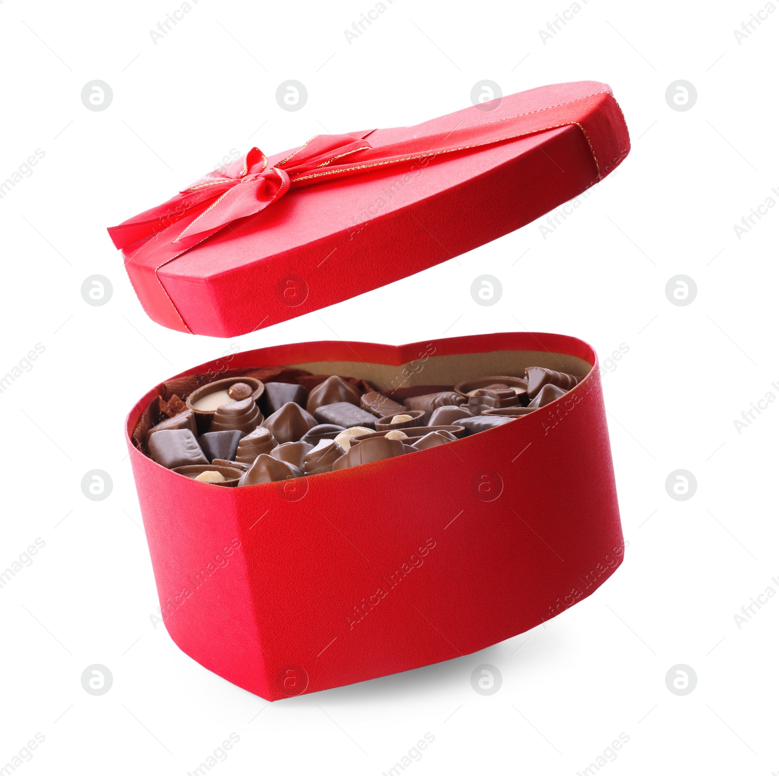 Photo of Heart shaped box with delicious chocolate candies on white background