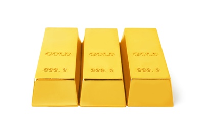 Photo of Precious shiny gold bars on white background