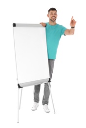 Photo of Professional business trainer near flip chart board on white background. Space for text