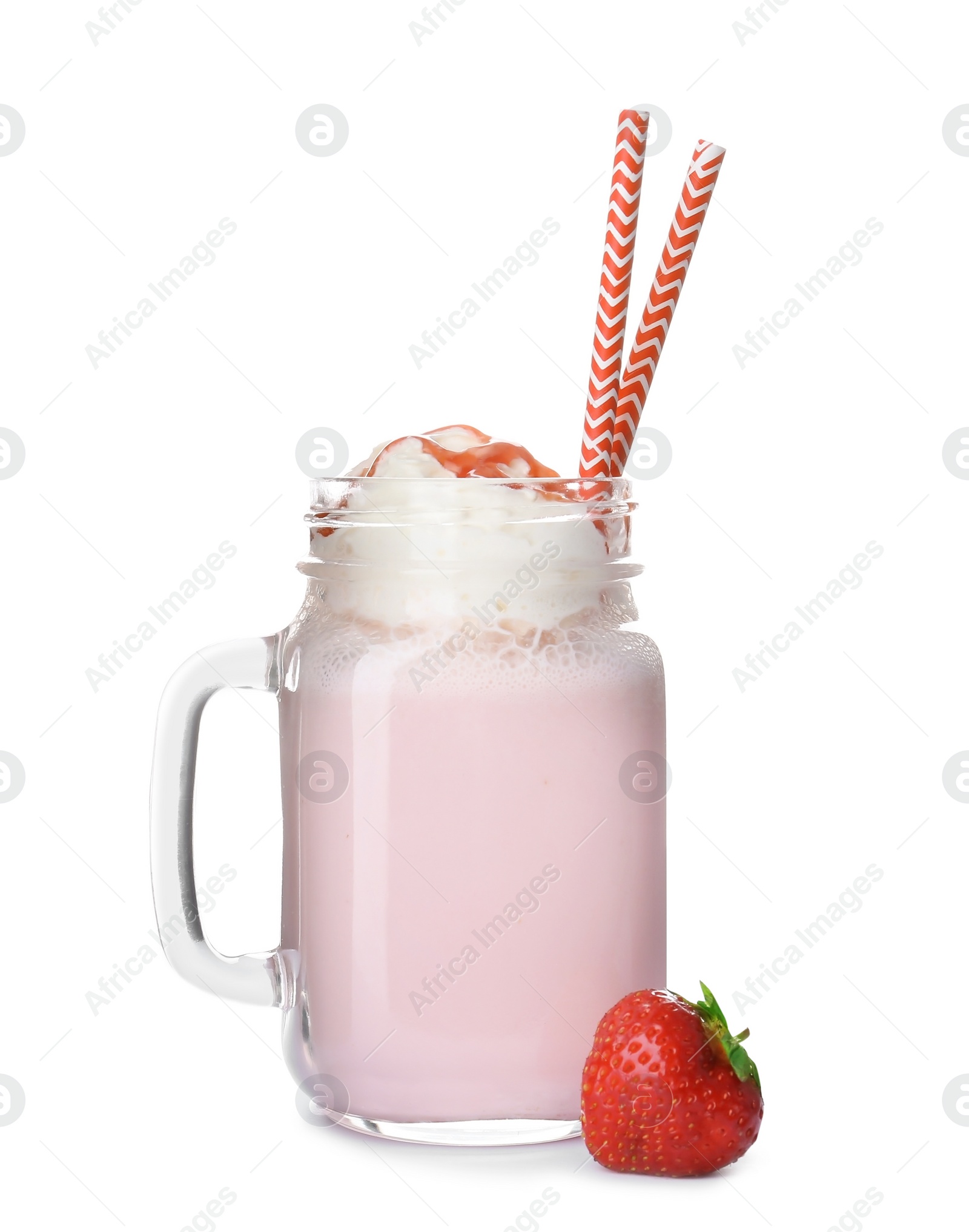 Photo of Mason jar with delicious milk shake on white background