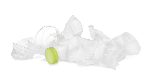 Pile of different plastic items on white background