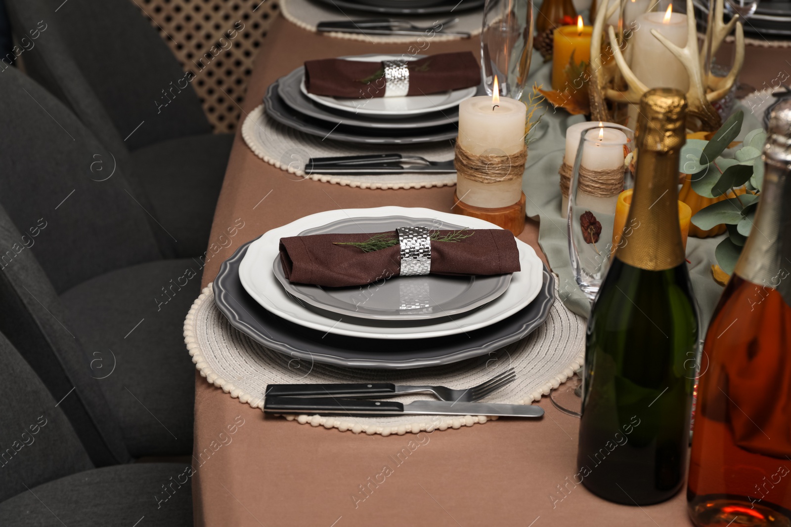 Photo of Table set with beautiful autumn decor for festive dinner