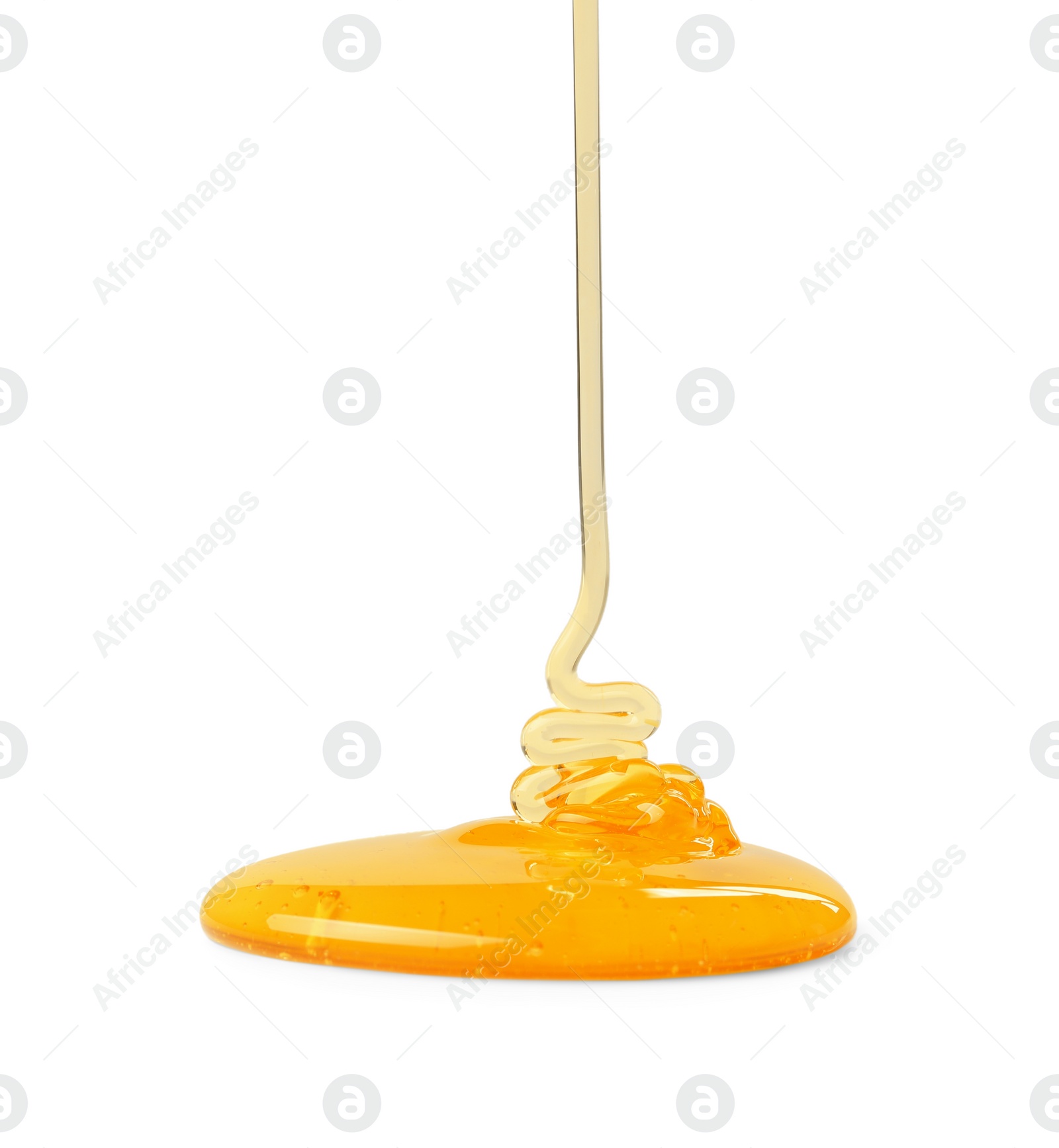 Photo of Pouring tasty natural honey isolated on white