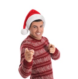 Photo of Handsome man wearing Santa hat on white background