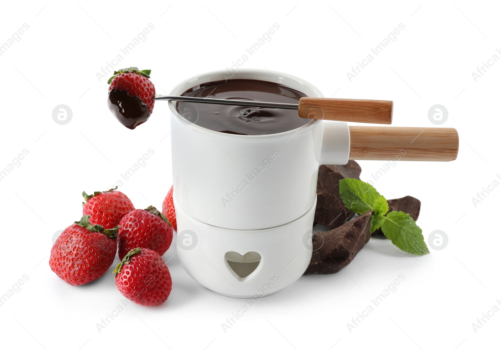 Photo of Fondue pot with chocolate and strawberry on white background