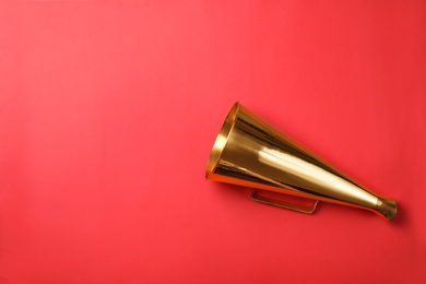 Photo of Retro megaphone on color background