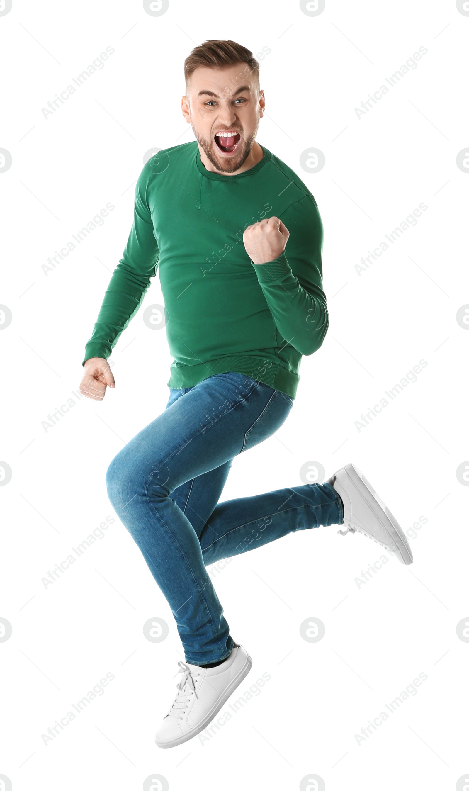 Photo of Full length portrait of emotional man jumping on white background