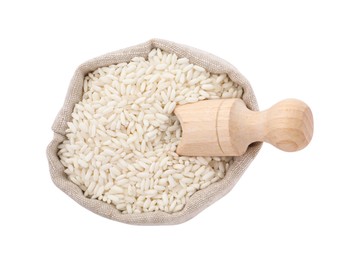 Photo of Raw rice in sack isolated on white, top view