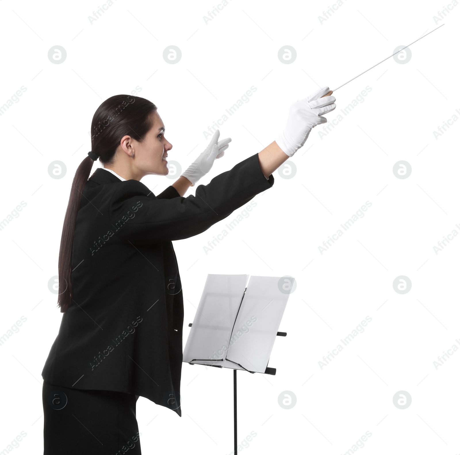 Photo of Professional conductor with baton and note stand on white background