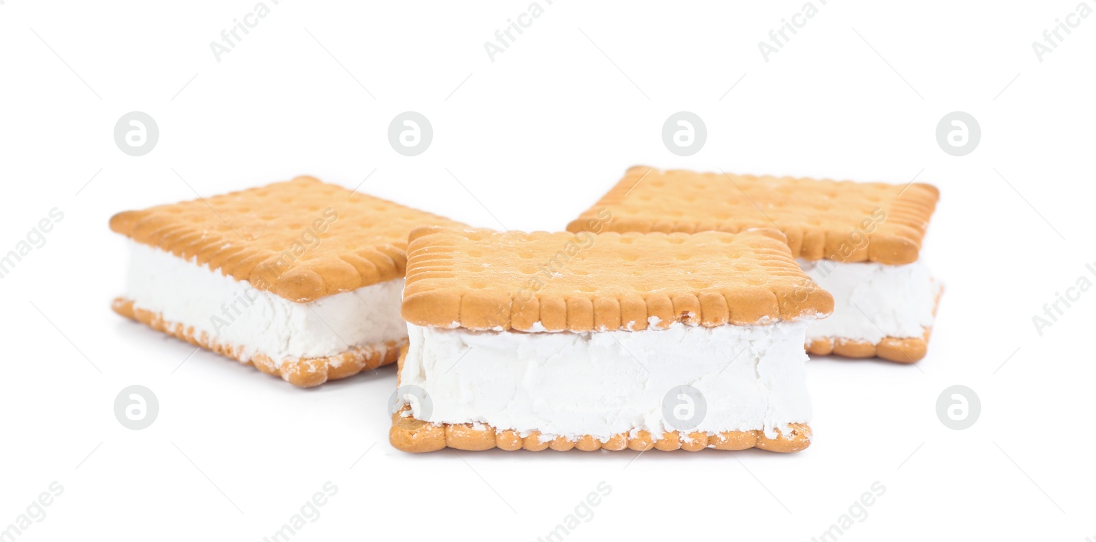 Photo of Sweet delicious ice cream cookie sandwiches isolated on white