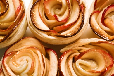 Freshly baked apple roses, top view. Beautiful dessert