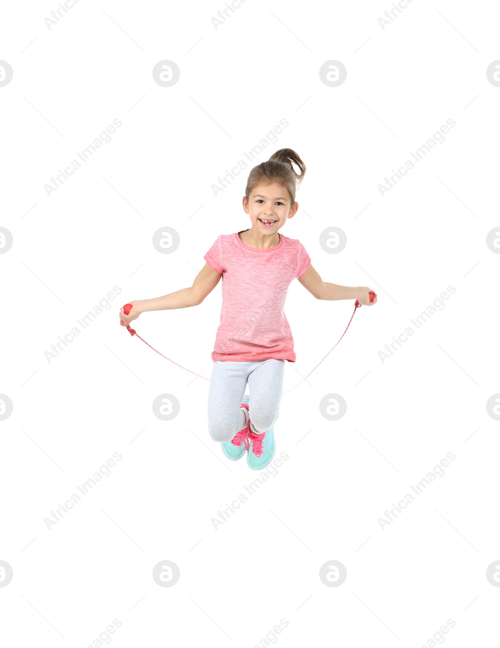 Photo of Full length portrait of girl jumping rope on white background