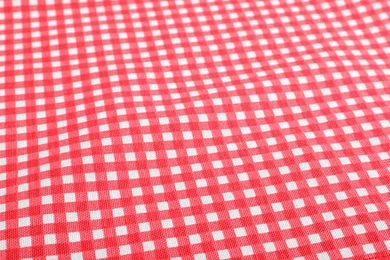 Photo of Classic red checkered picnic tablecloth as background