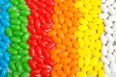 Photo of Delicious jelly beans of different colors, closeup