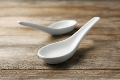 Clean Miso soup spoons on wooden table