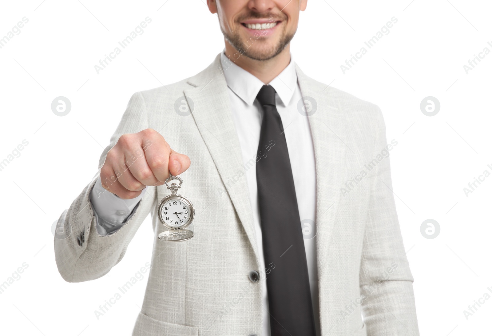 Photo of Happy businessman holding pocket watch on white background, closeup. Time management