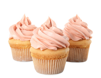 Photo of Delicious birthday cupcakes decorated with cream on white background