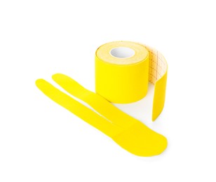 Bright kinesio tape roll and piece on white background