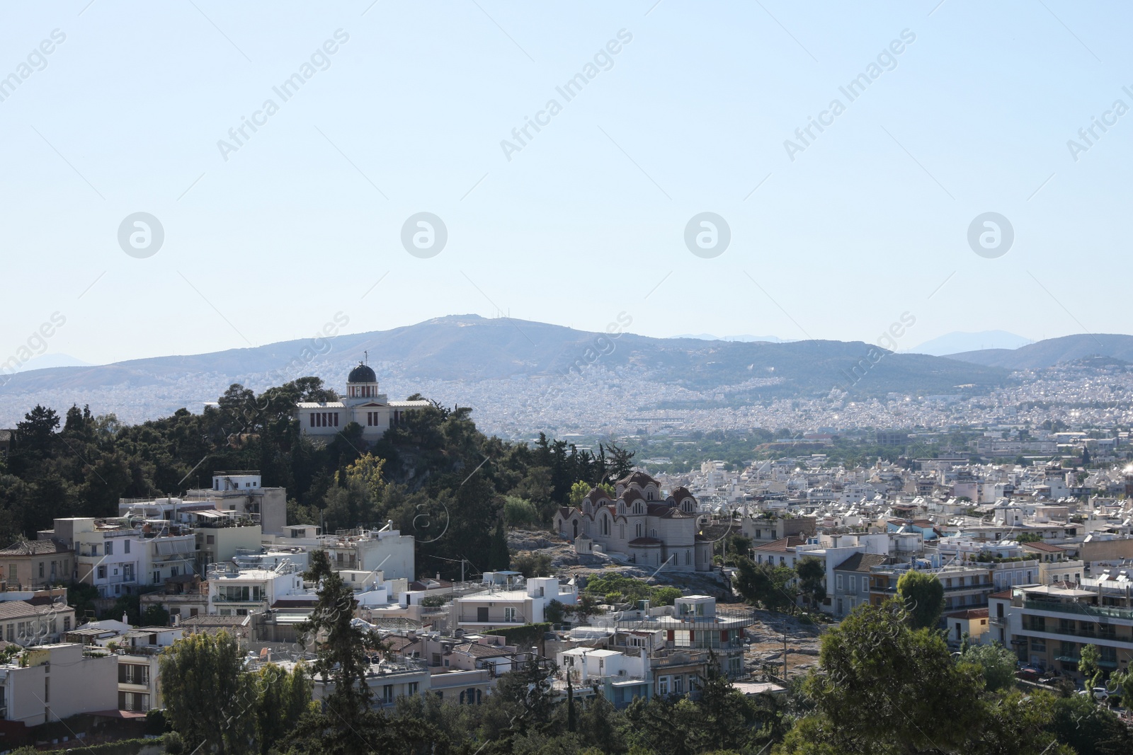 Photo of Picturesque view of cityscape with beautiful houses on sunny day