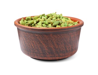 Photo of Ceramic bowl with dry cardamom seeds isolated on white
