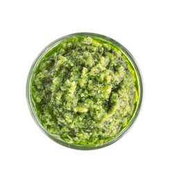 Photo of Bowl of tasty pesto sauce isolated on white, top view