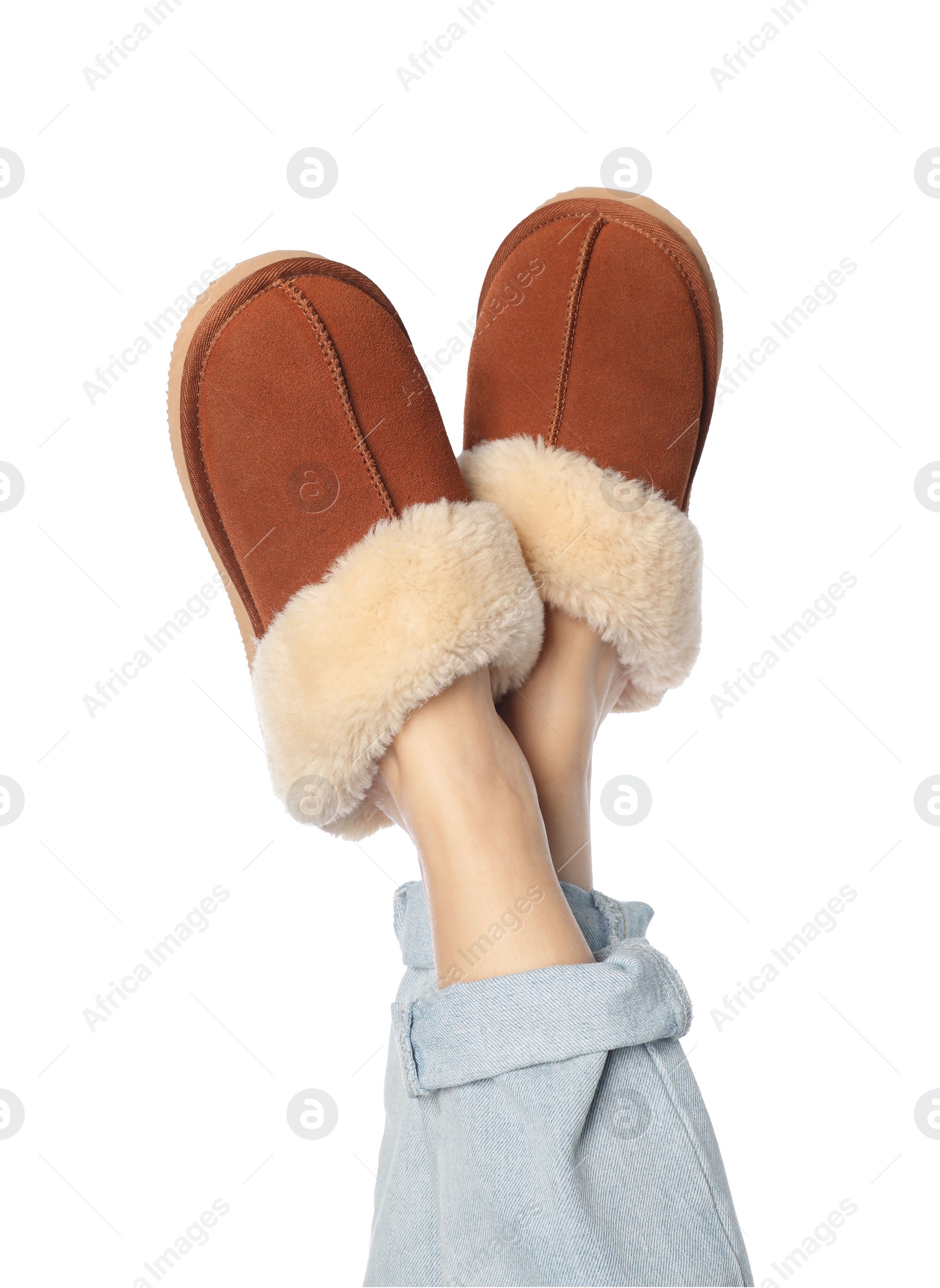 Photo of Woman in soft slippers on white background, closeup