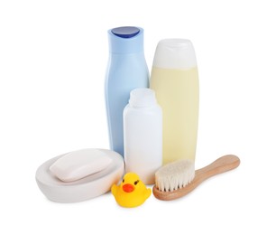 Photo of Baby cosmetic products, bath duck and brush isolated on white