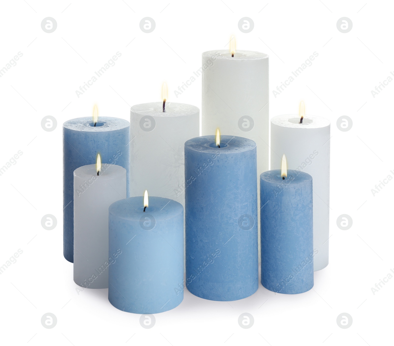 Photo of Set of different color candles on white background