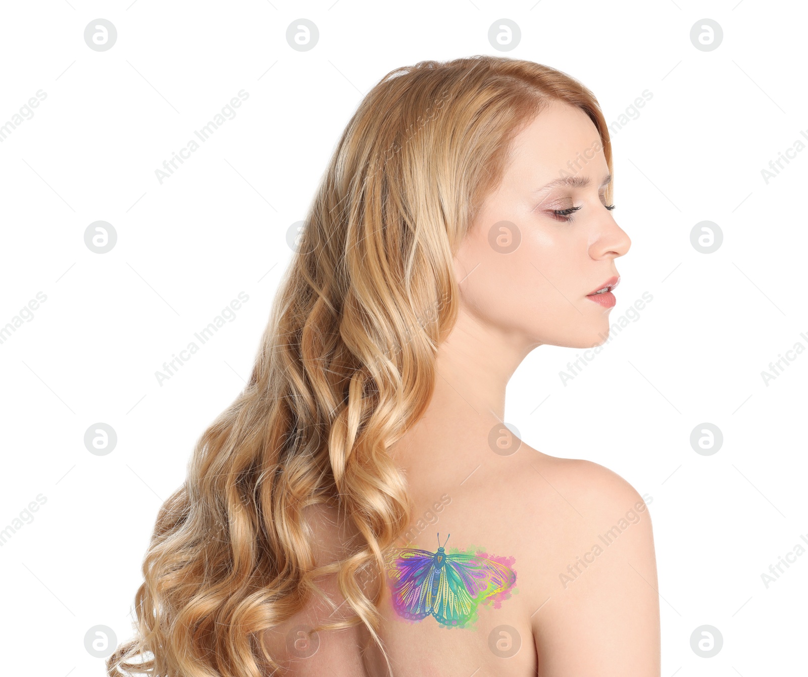 Image of Young woman with colorful tattoo of butterfly on her body against white background