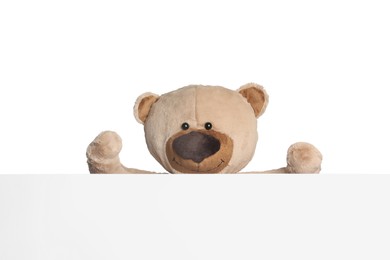 Photo of Cute teddy bear with blank card on white background