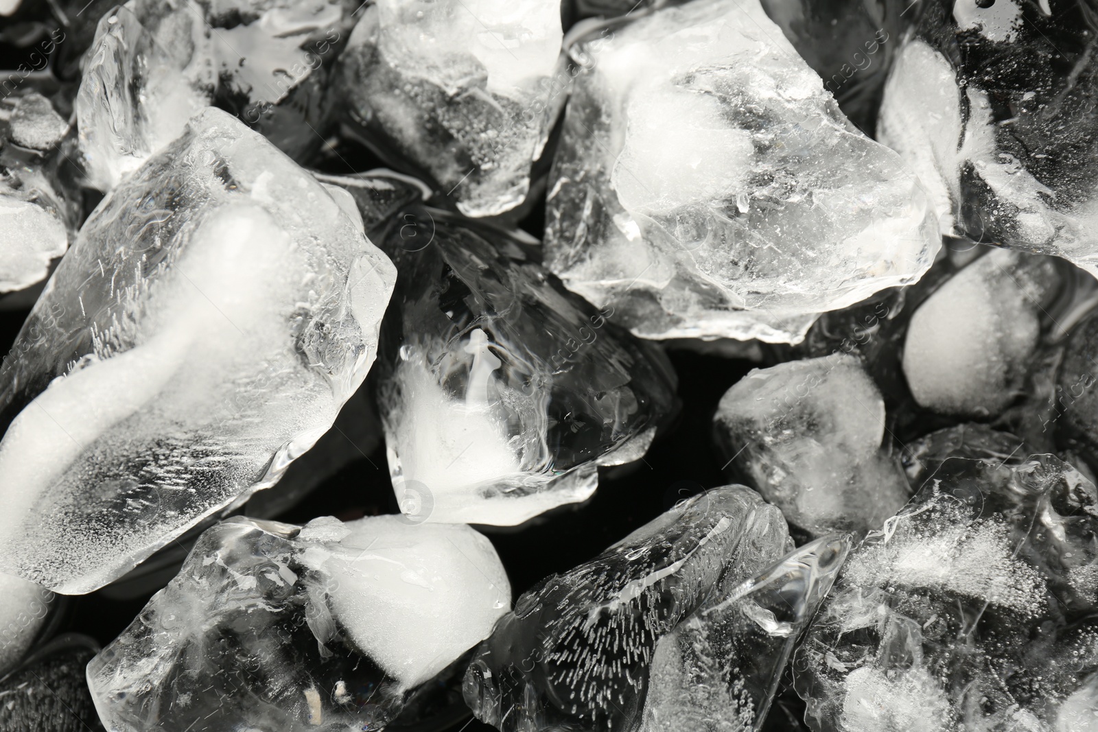 Photo of Pieces of crushed ice as background, closeup