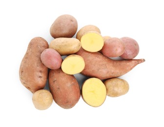 Photo of Different types of fresh potatoes on white background, top view