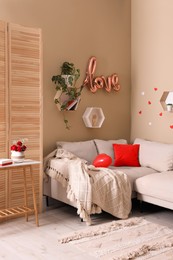 Photo of Cozy room decorated for Valentine's Day. Interior design