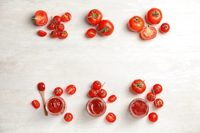 Photo of Composition with tasty homemade tomato sauce and space for text on white background, top view