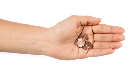 Young woman holding coins on white background, top view