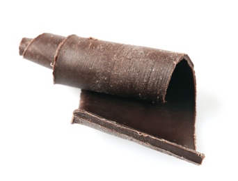 Photo of Yummy chocolate curl for decor on white background