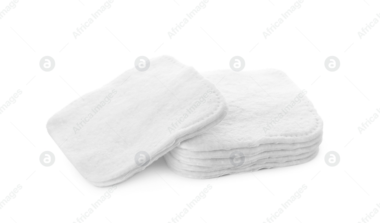 Photo of Pile of cotton pads on white background