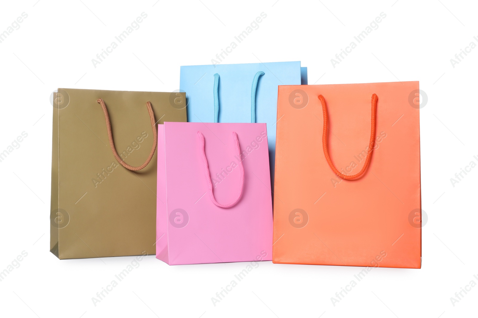 Photo of Colorful paper shopping bags isolated on white