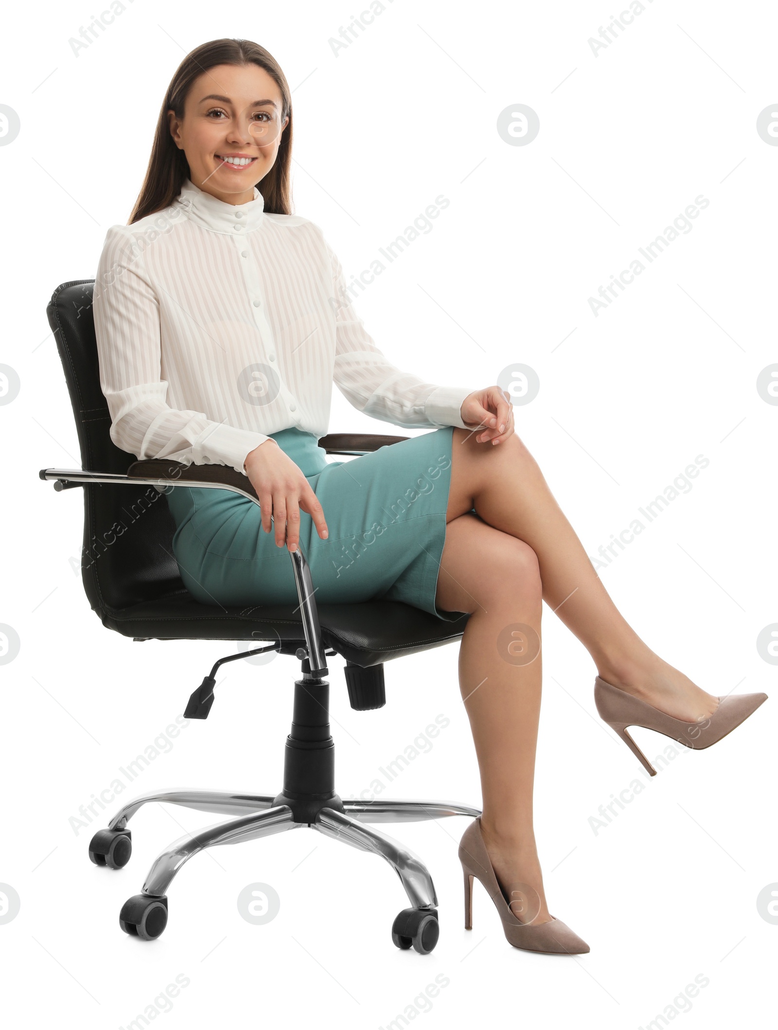 Photo of Young businesswoman sitting in comfortable office chair on white background