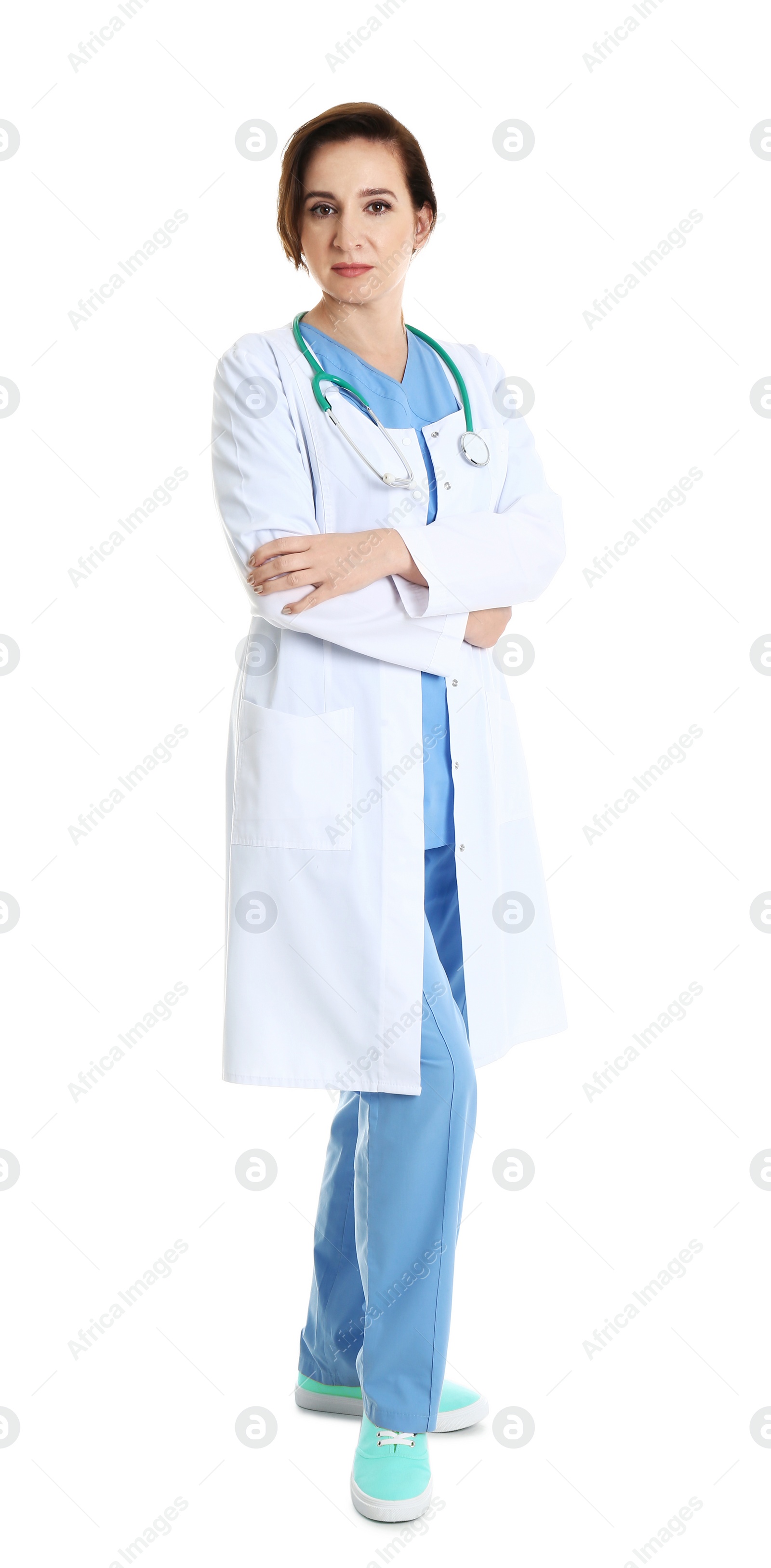 Photo of Full length portrait of experienced doctor in uniform on white background. Medical service