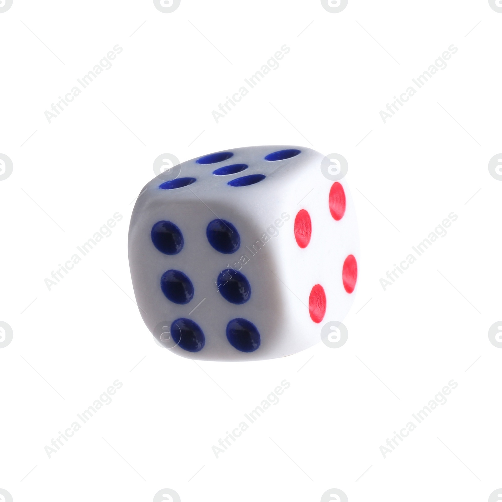 Photo of One plastic game dice isolated on white