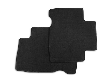 Photo of Black car floor carpets on white background, top view