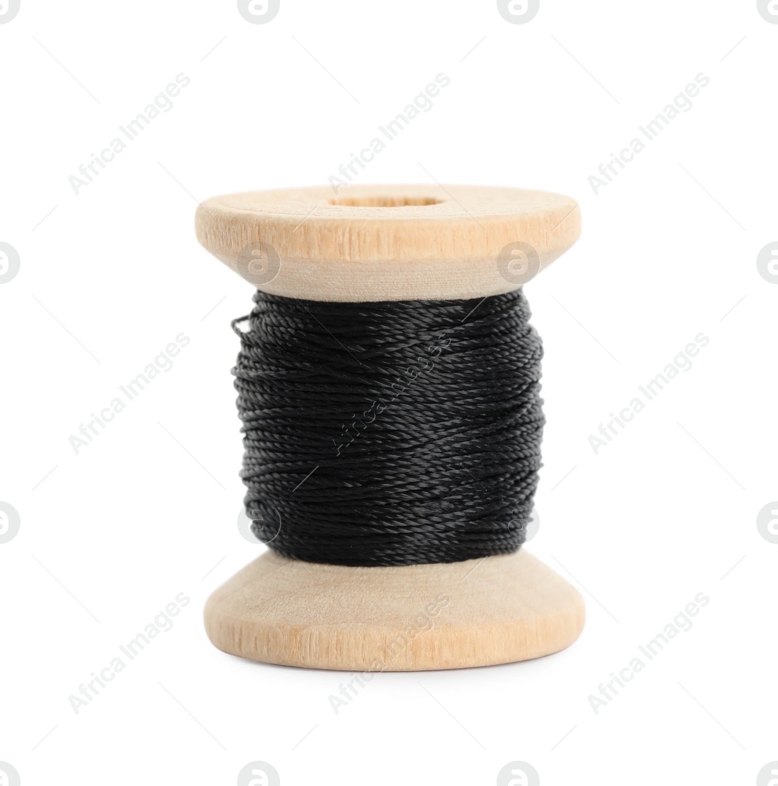 Photo of Wooden spool of black sewing thread isolated on white