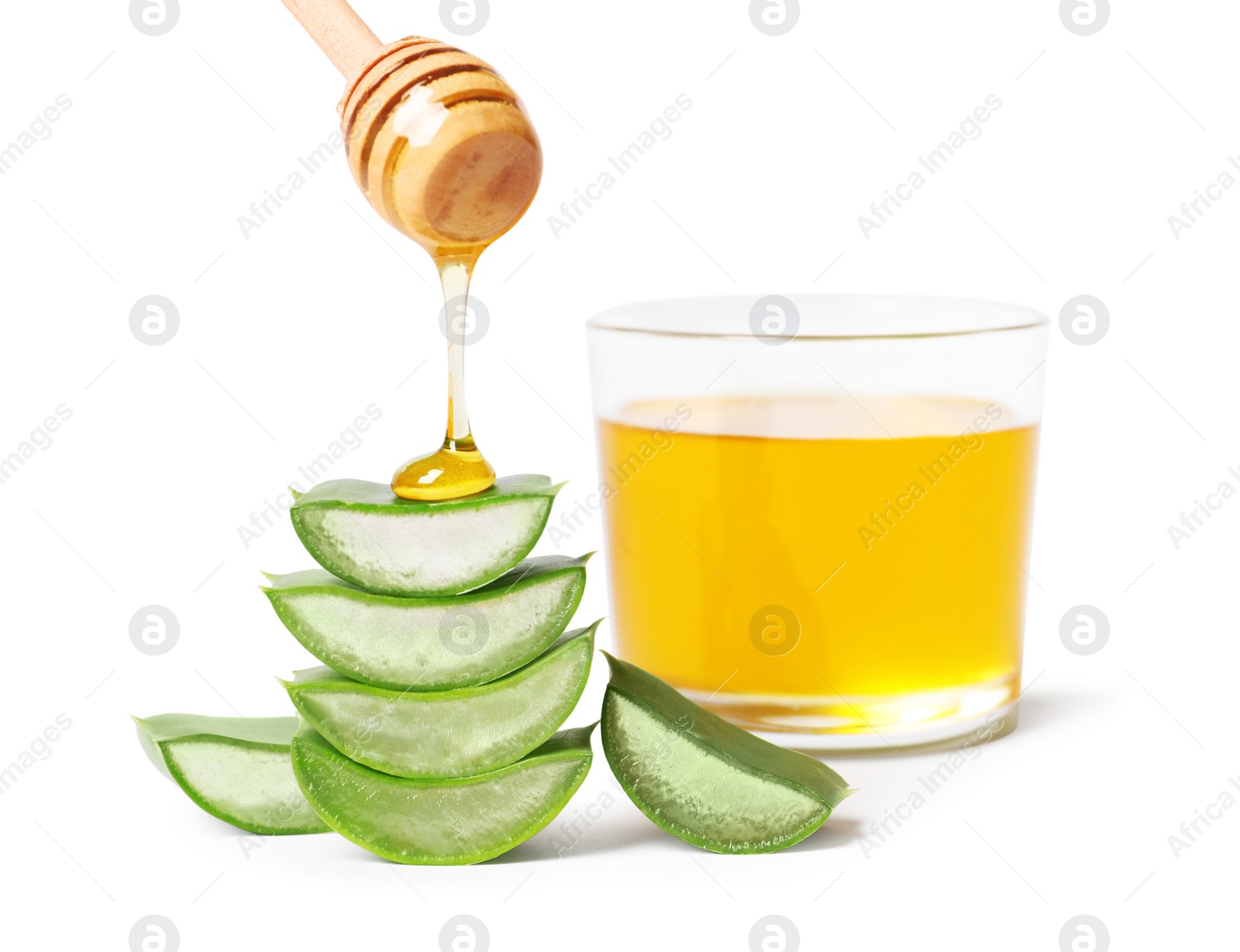 Photo of Pouring honey onto aloe vera on white background