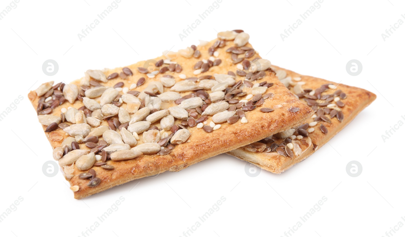 Photo of Cereal crackers with flax, sunflower and sesame seeds isolated on white