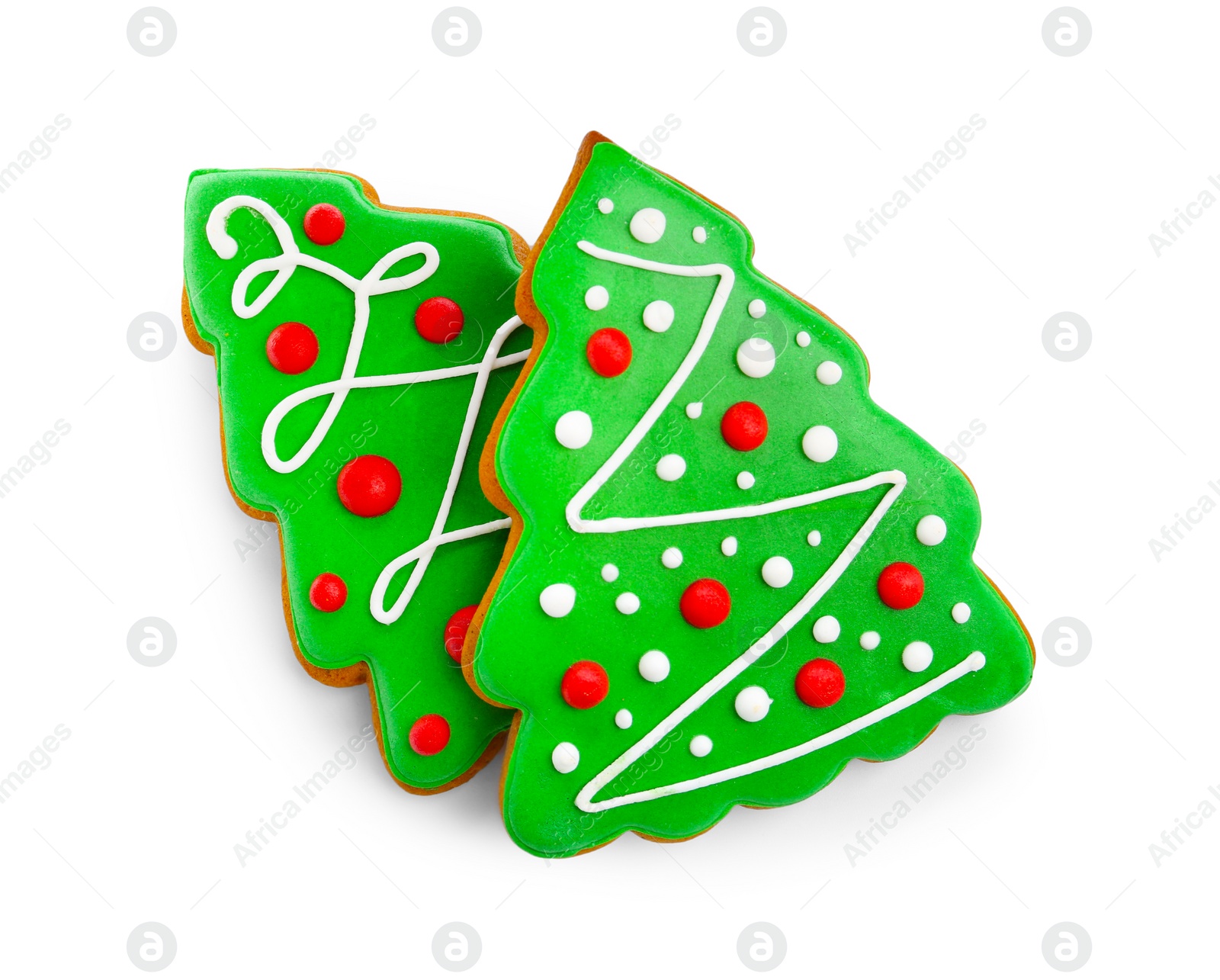 Photo of Tasty cookies in shape of Christmas trees isolated on white, top view