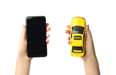 Photo of Woman with taxi car model and smartphone on white background, closeup. Space for design