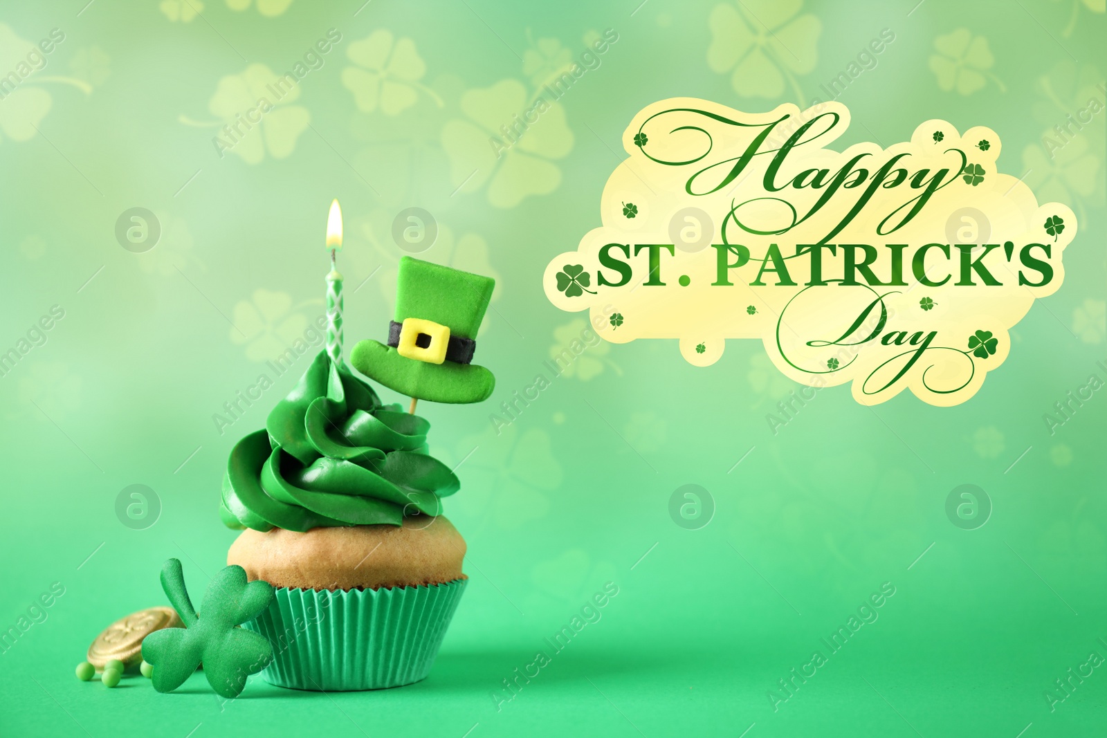 Image of Decorated cupcake on green background. St. Patrick's Day celebration