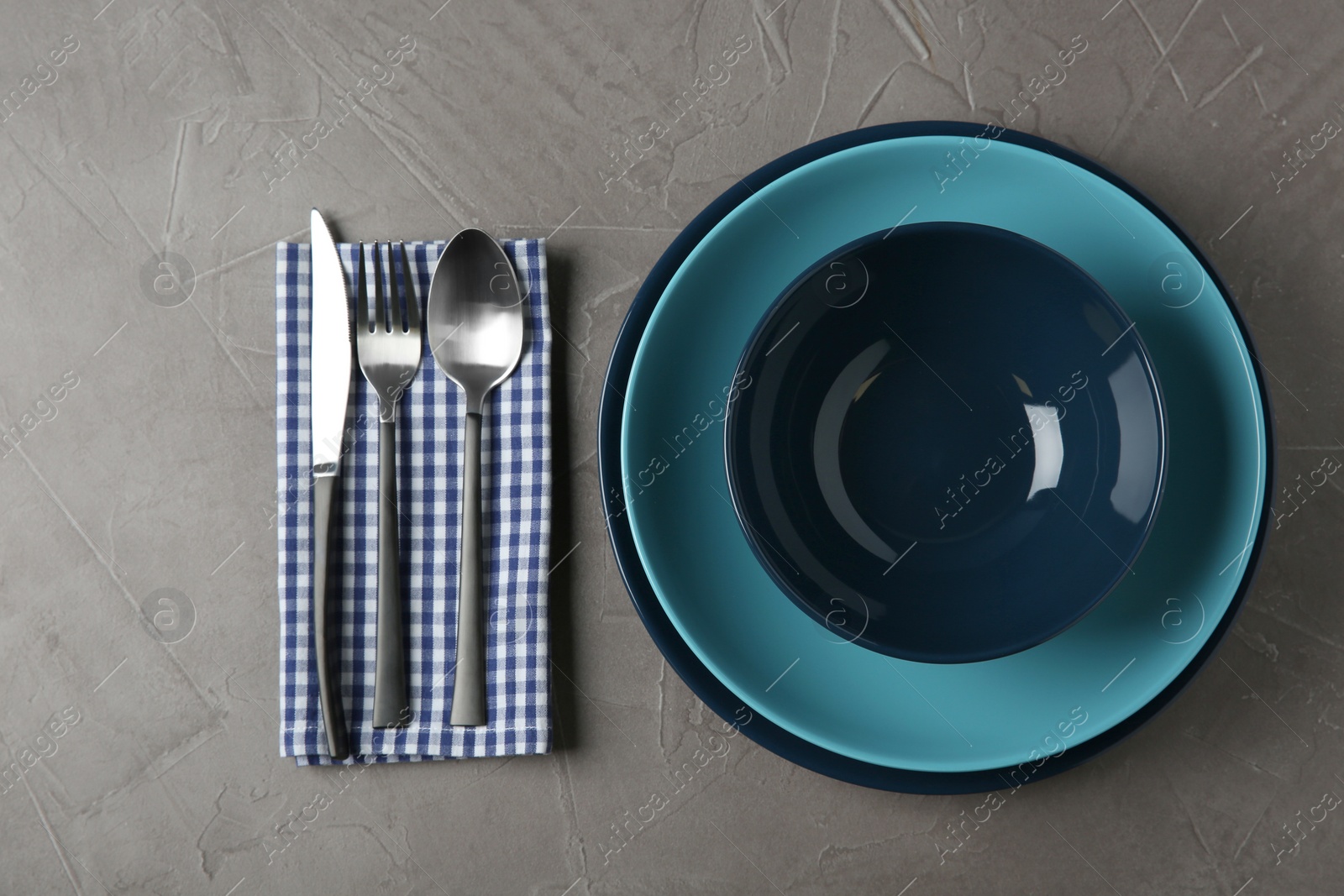 Photo of Beautiful table setting on grey background, flat lay